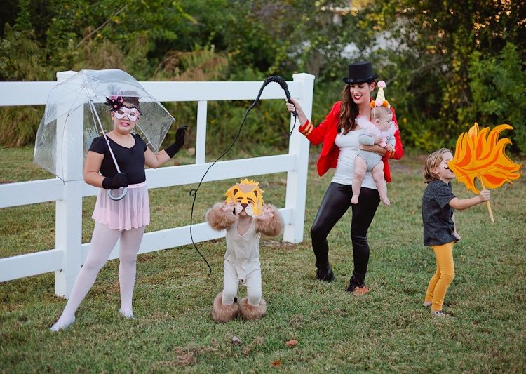 A DIY Family Circus Costume complete with Strong Man, Lion Tamer - Ring Master, Lion, Acrobat, Fire Breather and Clown! featured by popular Florida lifestyle blogger Fresh Mommy Blog | Cute Halloween Family Costume Ideas featured by top Florida lifestyle blogger, Fresh Mommy Blog: Family Circus
