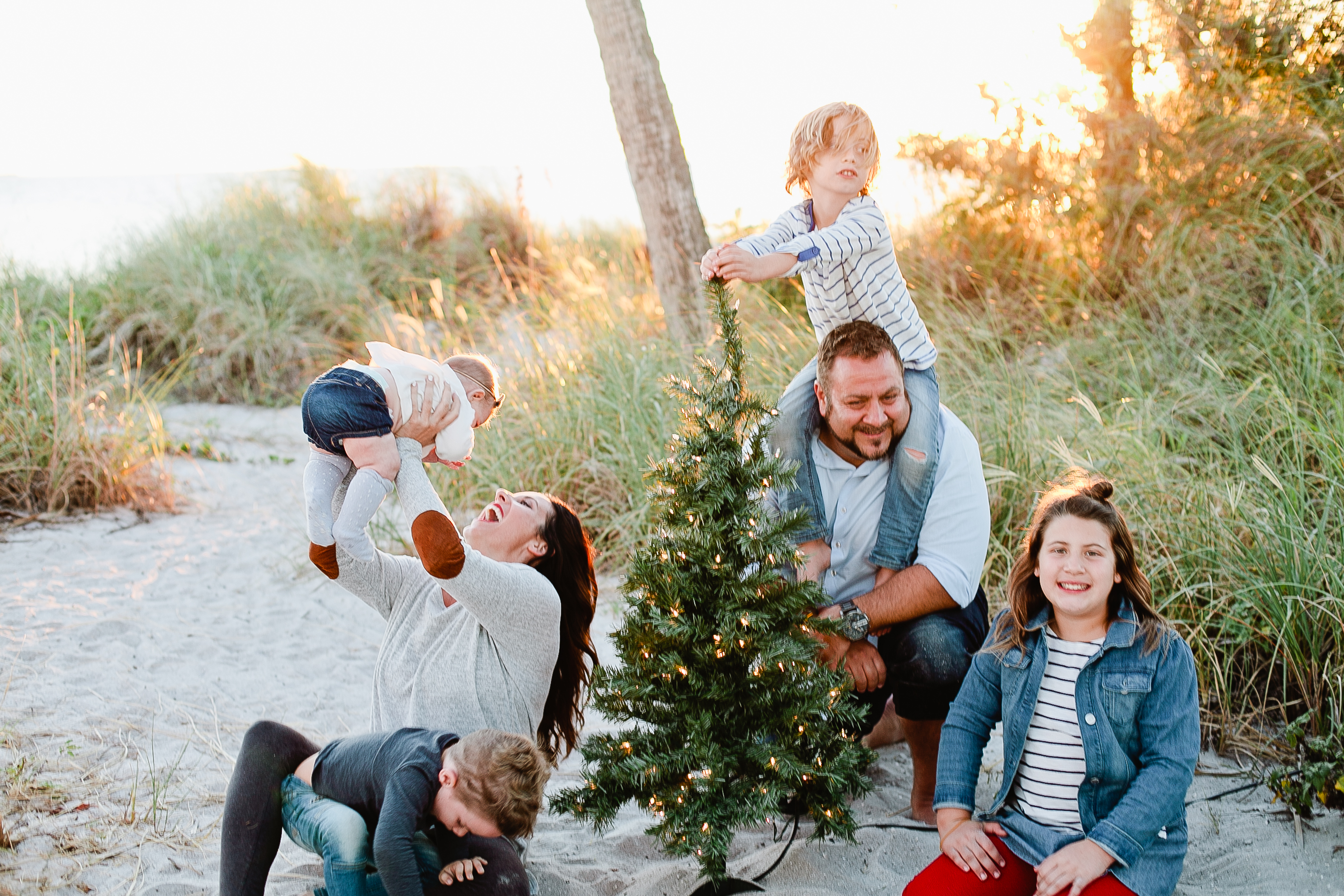 A frolicking, fun, family Christmas card photo shoot at the beach!