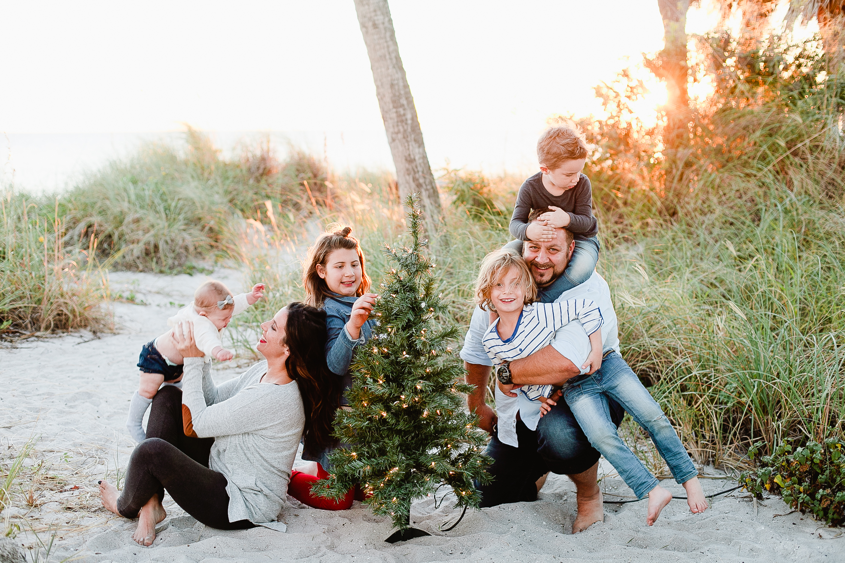 A frolicking, fun, family Christmas card photo shoot at the beach!
