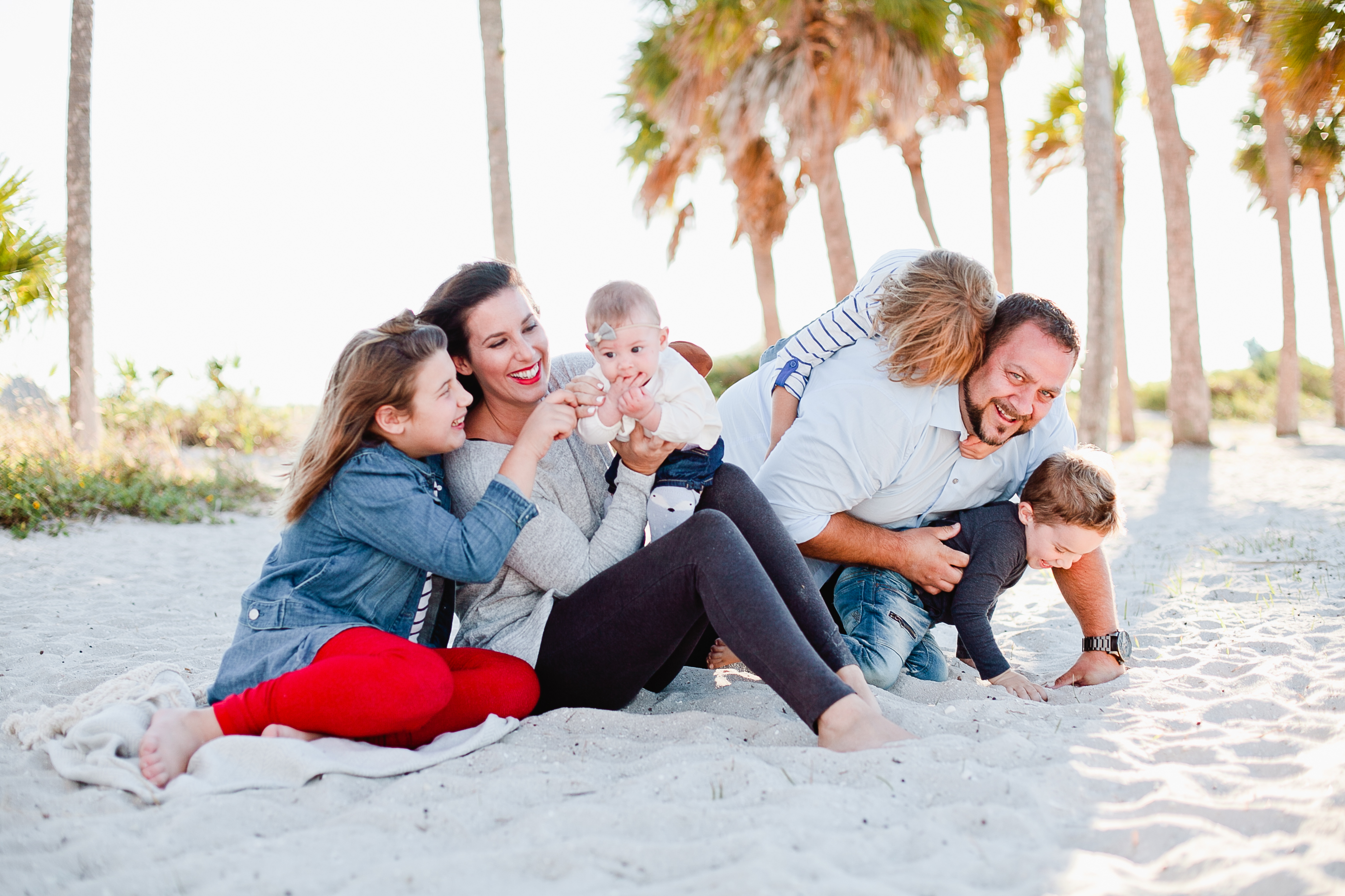 A frolicking, fun, family Christmas card photo shoot at the beach!
