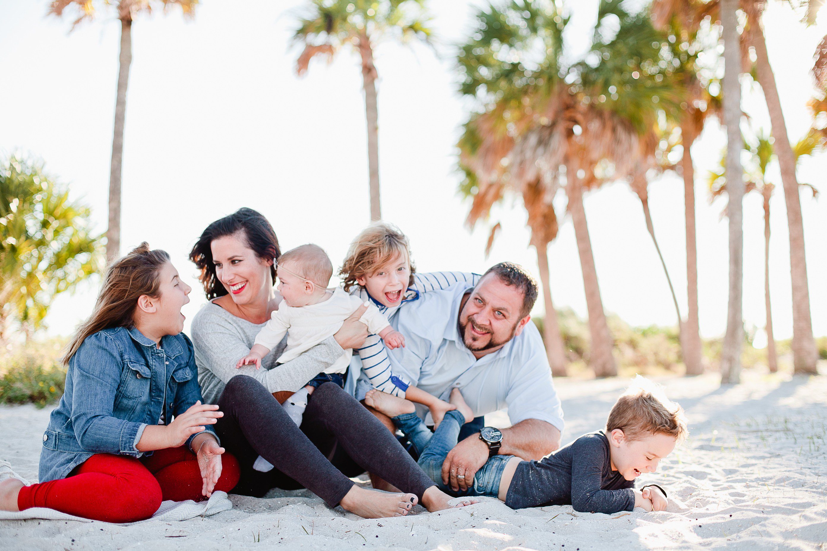 A frolicking, fun, family Christmas photo shoot at the beach!