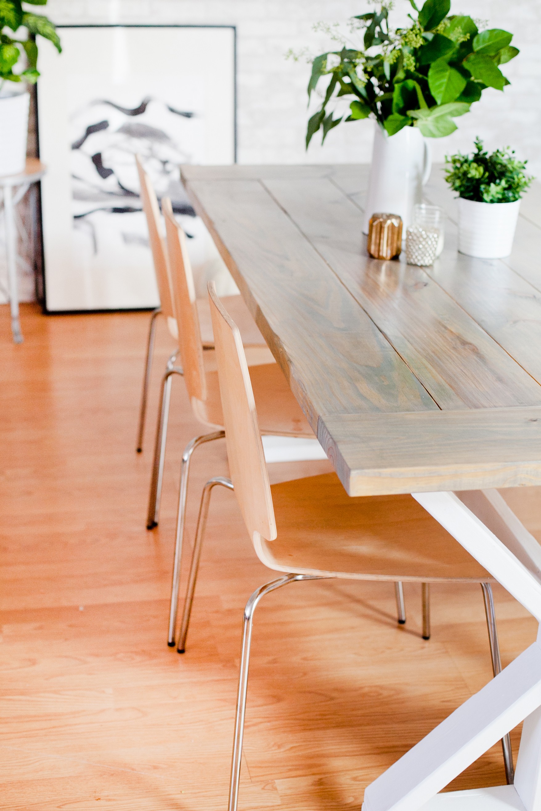 A DIY Farmhouse Table for Kitchen or Dining for under $100. See the full farmhouse table tutorial!