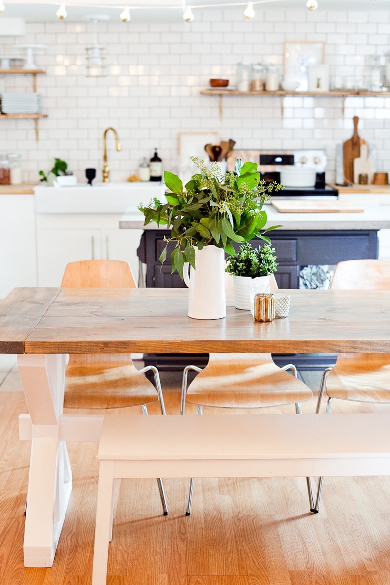 A DIY Farmhouse Table for Kitchen or Dining for under $100. See the full farmhouse table tutorial!