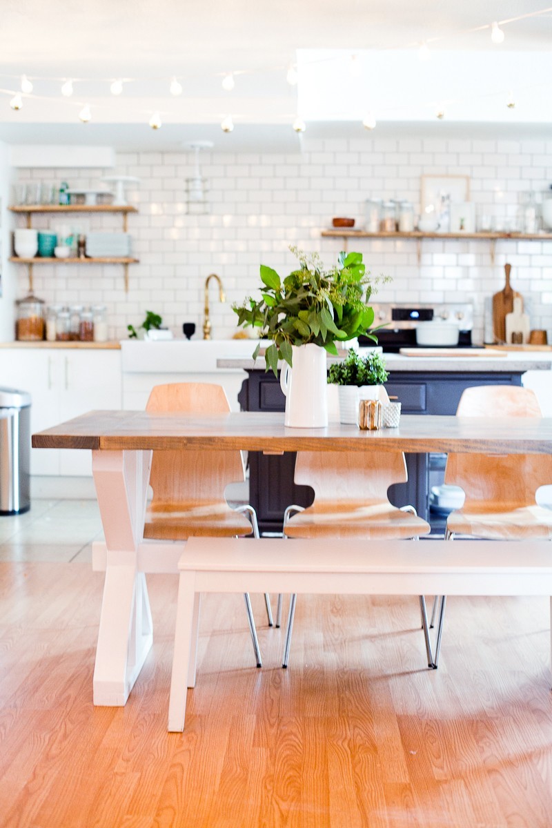 A DIY Farmhouse Table for Kitchen or Dining for under $100. See the full farmhouse table tutorial!