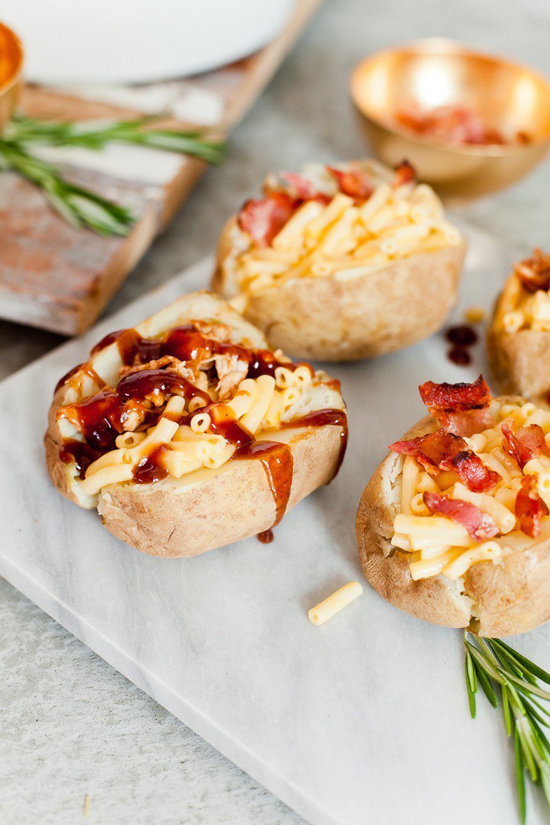Mac and Cheese Stuffed Baked Potato. Top with BBQ chicken or bacon for a delicious twist on a classic meal.