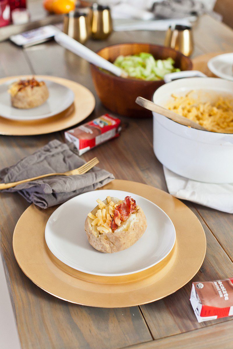 Mac and Cheese Stuffed Baked Potato. Top with BBQ chicken or bacon for a delicious twist on a classic meal.