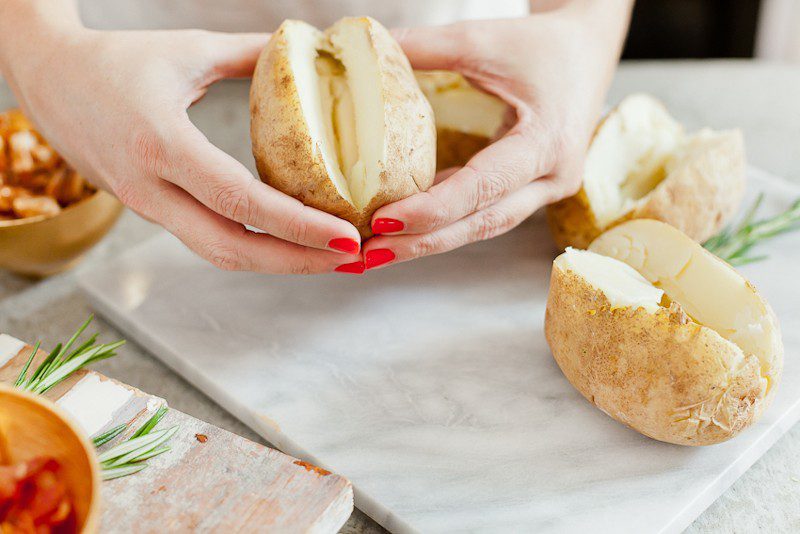 Mac and Cheese Stuffed Baked Potato. Top with BBQ chicken or bacon for a delicious twist on a classic meal.