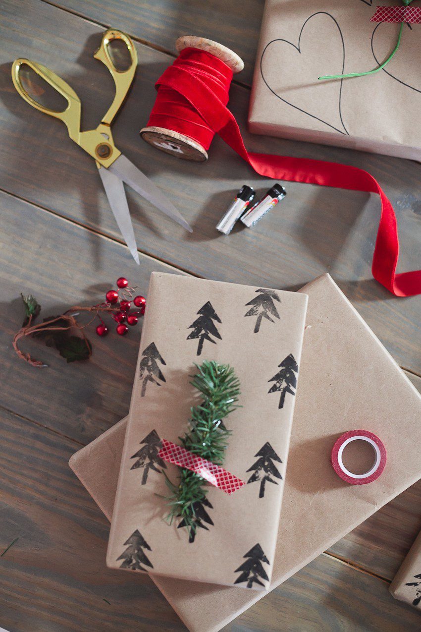 Save time and money with this easy and simple Christmas gift wrap hack! Gift wrapping ideas you can't miss, like using a potato to stamp your customized design.  | The Simple and Easy Christmas Gift Wrapping Ideas You Can't Miss feeatured by top Florida life and style blog Fresh Mommy Blog