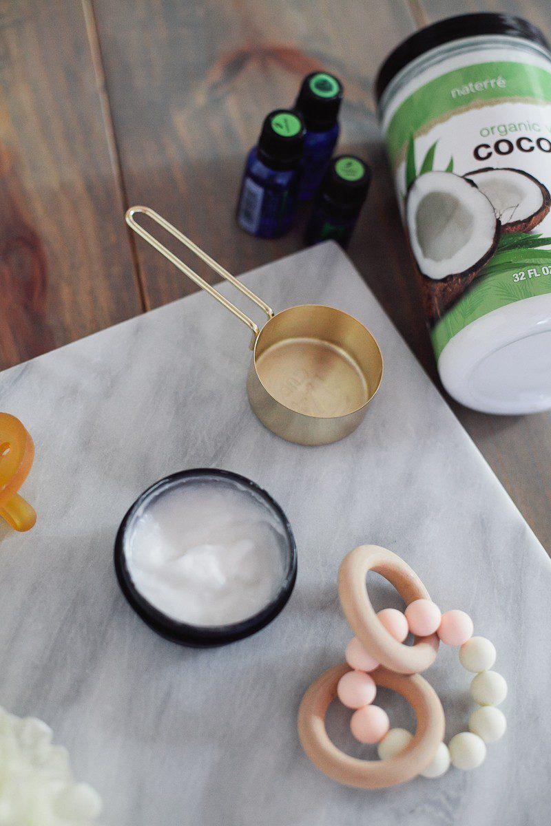 Fresh Essentials All Natural Homemade Healing Diaper Cream for Baby with Essential Oils! An easy essential oil recipe to sooth, calm and heal baby's skin. Made with coconut oil, lavender, melaleuca and frankincense essential oils to combat redness, diaper rash, bacteria and more.