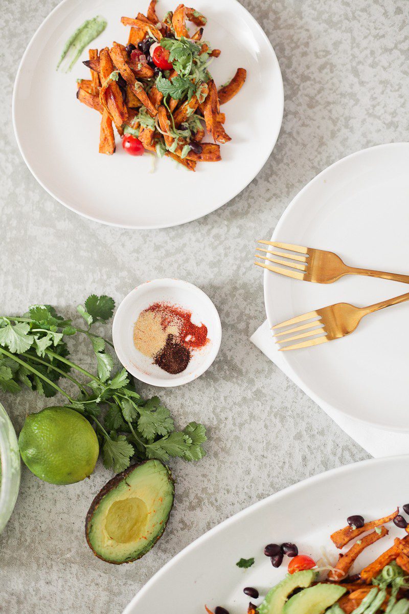 A delicious twist on a loaded fry platter that won't mess with your waistline or derail your resolutions! Need a dinner to drool over? Try these Loaded Sweet Potato Mexican Street Fries!