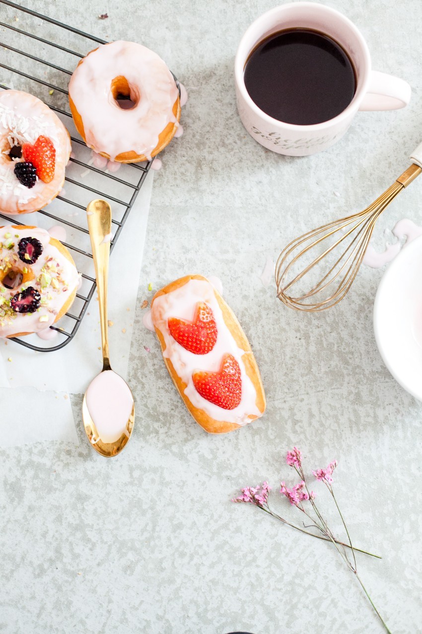 There's definitely no right or wrong way to celebrate with donuts, whether it be a special occasion or a normal day you want to delight in. Invite some friends over or bring out your toppings and let the family have at it to sweeten the deal! Let everyone frost their own DIY pretty in pink donuts and compare toppings before indulging that sweet tooth with every bite!