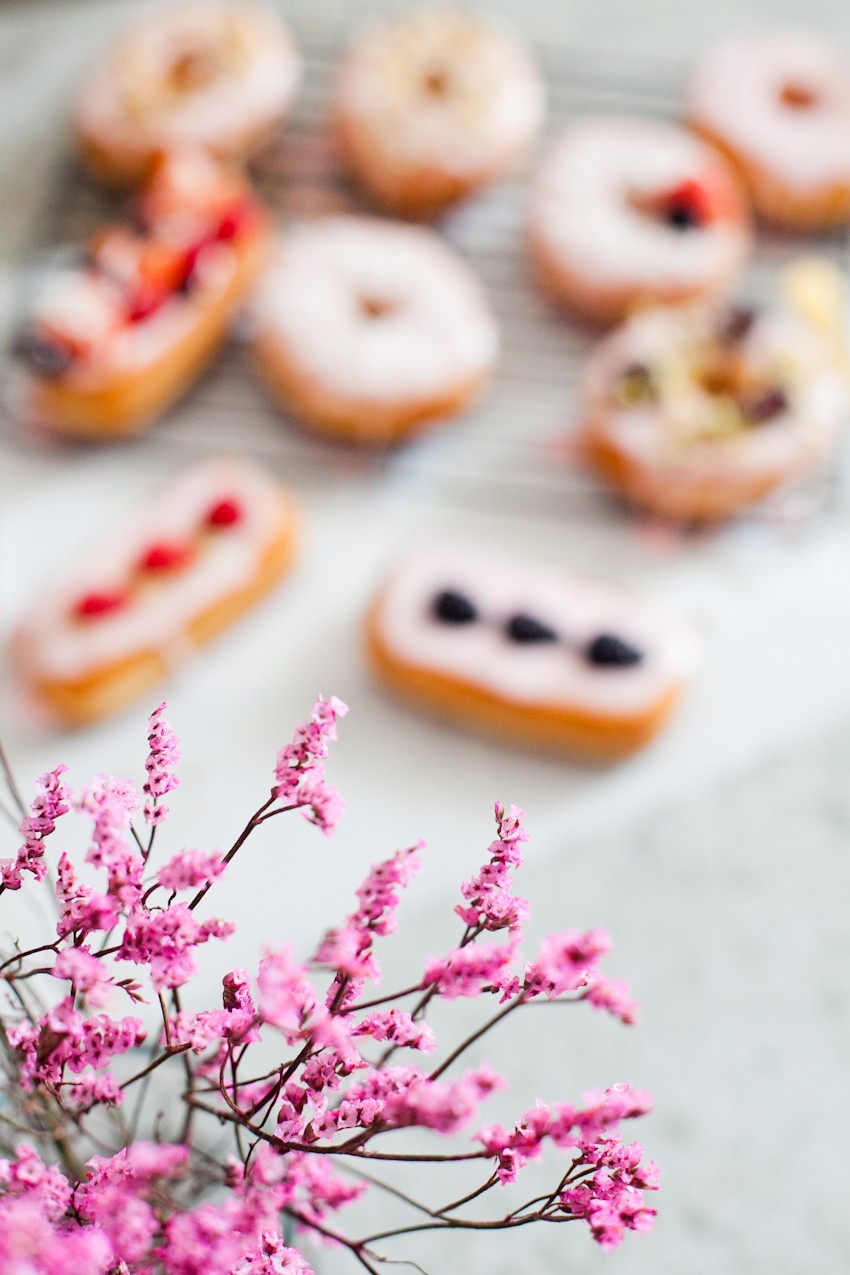 There's definitely no right or wrong way to celebrate with donuts, whether it be a special occasion or a normal day you want to delight in. Invite some friends over or bring out your toppings and let the family have at it to sweeten the deal! Let everyone frost their own DIY pretty in pink donuts and compare toppings before indulging that sweet tooth with every bite!