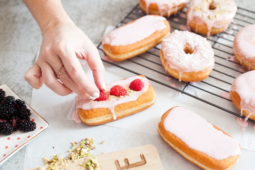 There's definitely no right or wrong way to celebrate with donuts, whether it be a special occasion or a normal day you want to delight in. Invite some friends over or bring out your toppings and let the family have at it to sweeten the deal! Let everyone frost their own DIY pretty in pink donuts and compare toppings before indulging that sweet tooth with every bite!