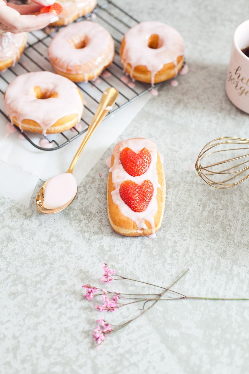 There's definitely no right or wrong way to celebrate with donuts, whether it be a special occasion or a normal day you want to delight in. Invite some friends over or bring out your toppings and let the family have at it to sweeten the deal! Let everyone frost their own DIY pretty in pink donuts and compare toppings before indulging that sweet tooth with every bite!