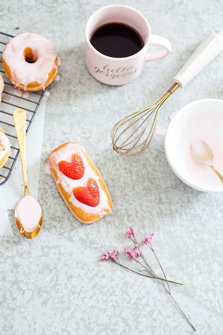 There's definitely no right or wrong way to celebrate with donuts, whether it be a special occasion or a normal day you want to delight in. Invite some friends over or bring out your toppings and let the family have at it to sweeten the deal! Let everyone frost their own DIY pretty in pink donuts and compare toppings before indulging that sweet tooth with every bite!