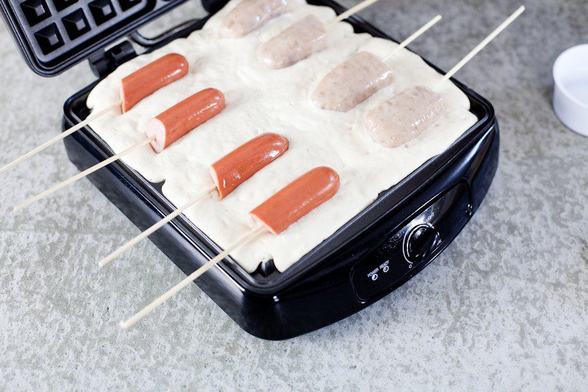 The quick and simple way to make Waffle Dog on a Stick with Orange Maple Glaze. Kids love it and so do adults! Perfect for a meal, a party or an appetizer!