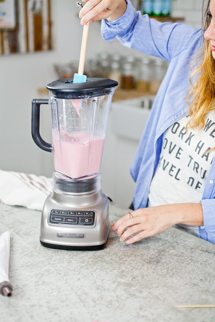 These Epic Royal Crazy milkshakes are indulgently MAGICAL! A rich, thick strawberry milkshake is topped with a sugaring of sprinkles and candies to make a delicious drink fit for a princess... or a prince. A pretty in pink and purple freak shake!
