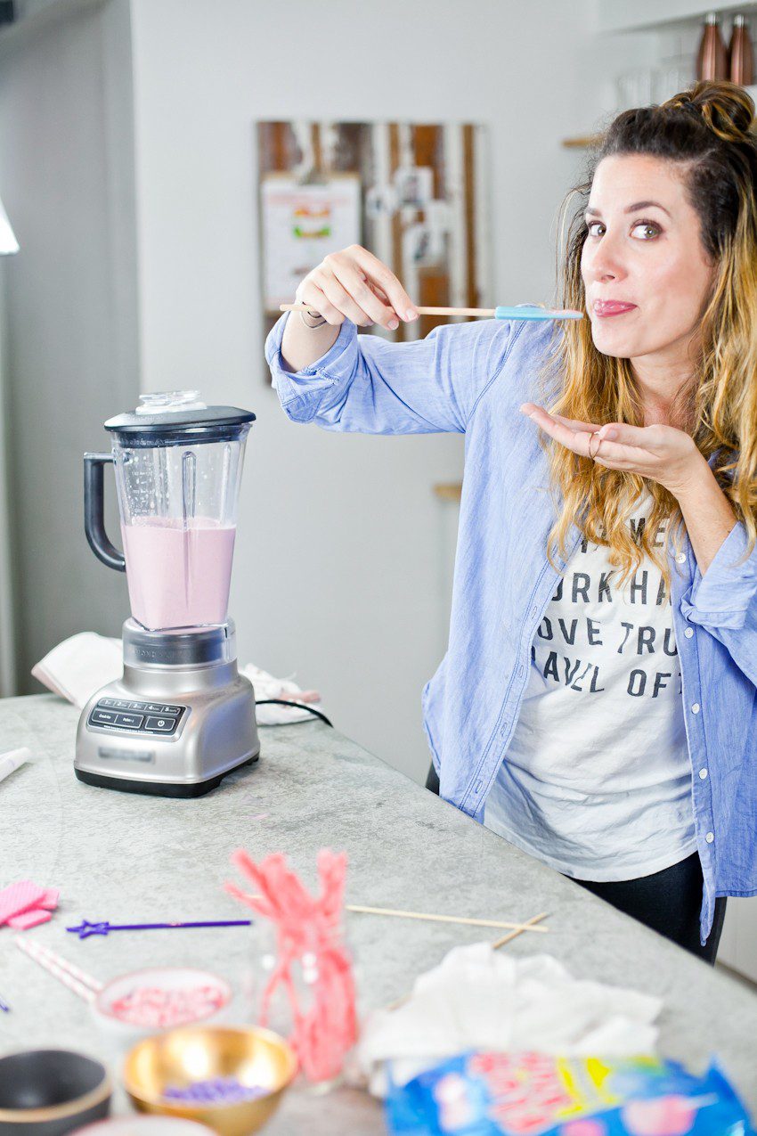 These Epic Royal Crazy milkshakes are indulgently MAGICAL! A rich, thick strawberry milkshake is topped with a sugaring of sprinkles and candies to make a delicious drink fit for a princess... or a prince. A pretty in pink and purple freak shake!
