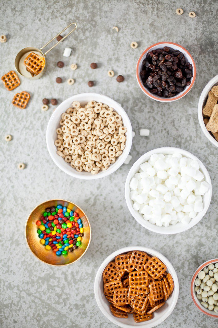 Kid Friendly Trail Mix Puppy Chow Activity and Snack! The kids will love this fun way to build and create their own trail mix, even on a rainy day!