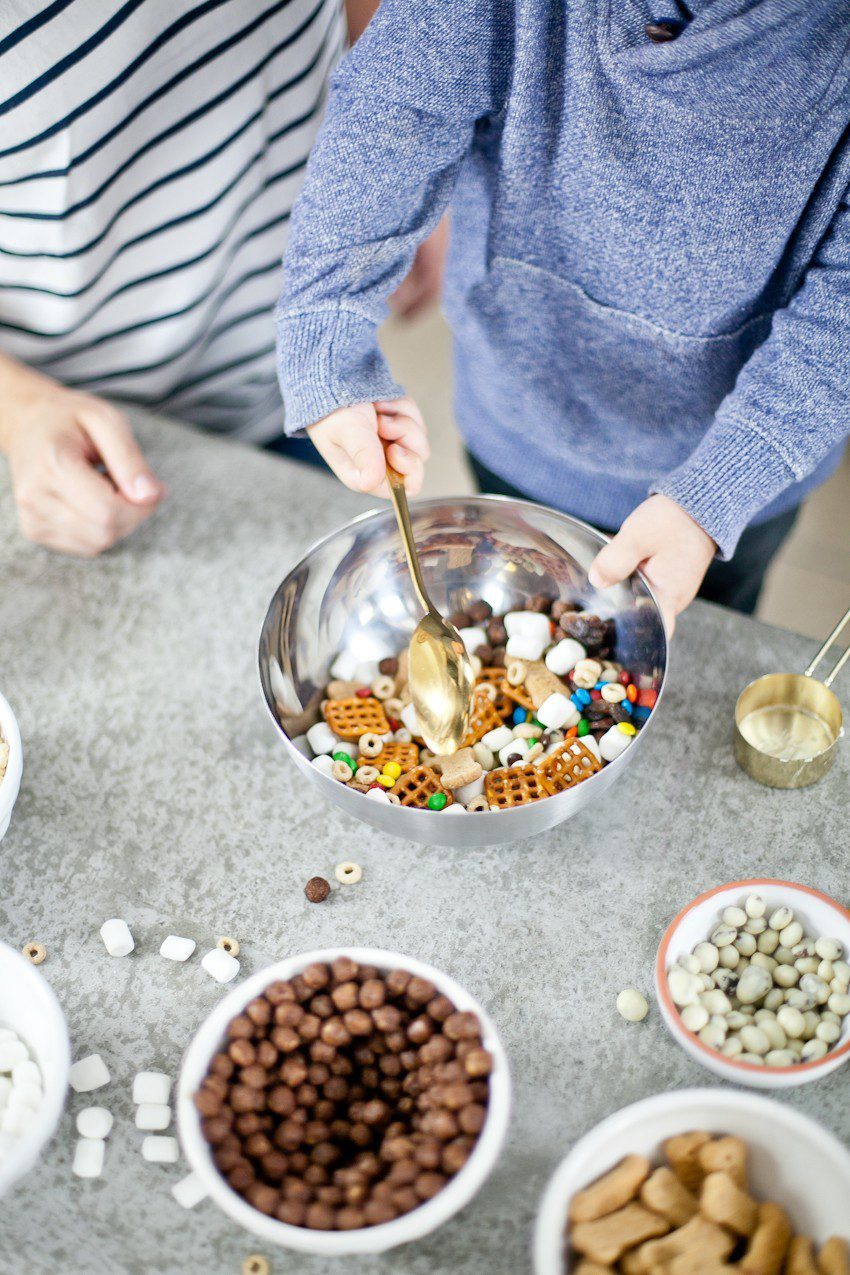 Kid Friendly Trail Mix Puppy Chow Activity and Snack! The kids will love this fun way to build and create their own trail mix, even on a rainy day!
