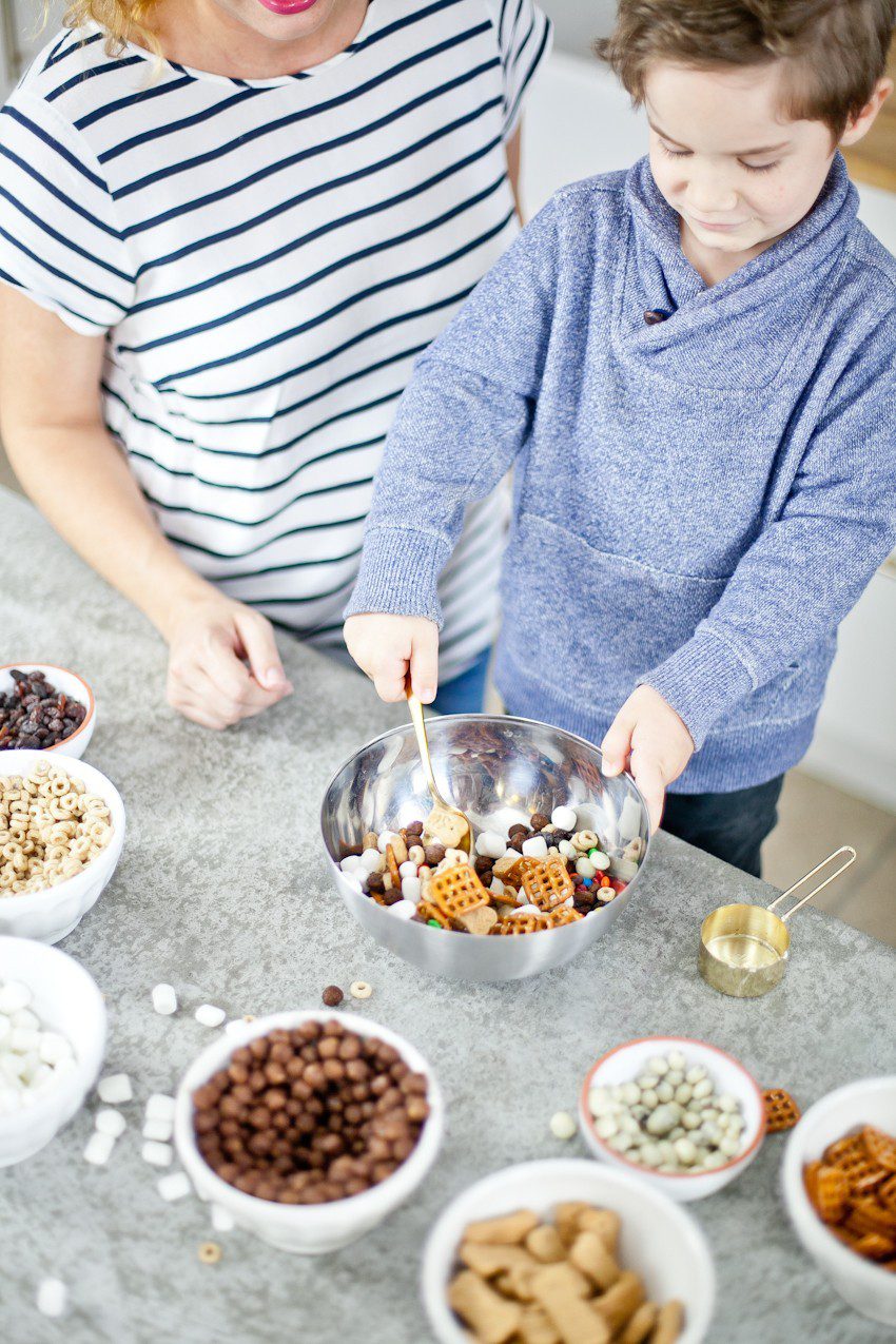 Kid Friendly Trail Mix Puppy Chow Activity and Snack! The kids will love this fun way to build and create their own trail mix, even on a rainy day!