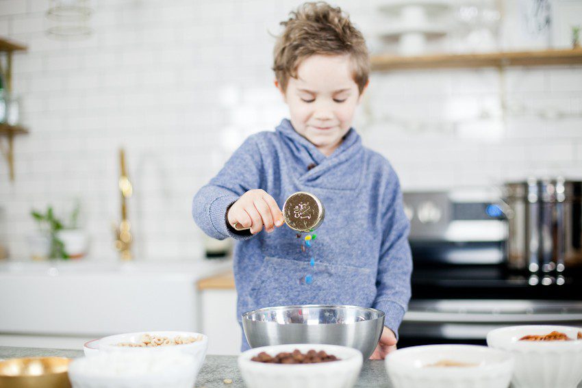 Kid Friendly Trail Mix Puppy Chow Activity and Snack! The kids will love this fun way to build and create their own trail mix, even on a rainy day!