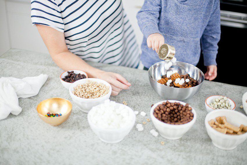 Kid Friendly Trail Mix Puppy Chow Activity and Snack! The kids will love this fun way to build and create their own trail mix, even on a rainy day!