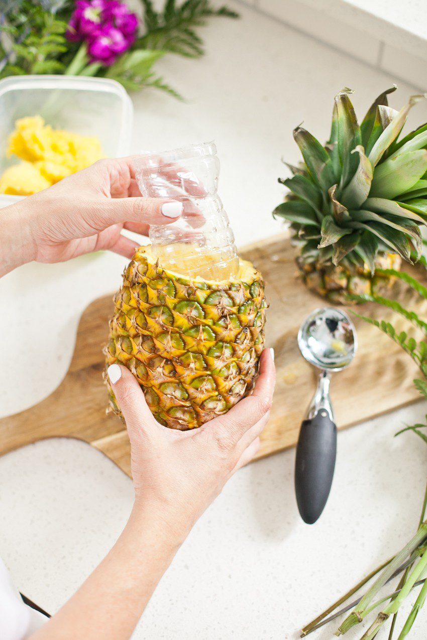 Pineapple Flower Arrangement for garden parties or a summer tropical fete! This DIY Pineapple vase is an easy to make centerpiece or perfect for a Tiki bar!