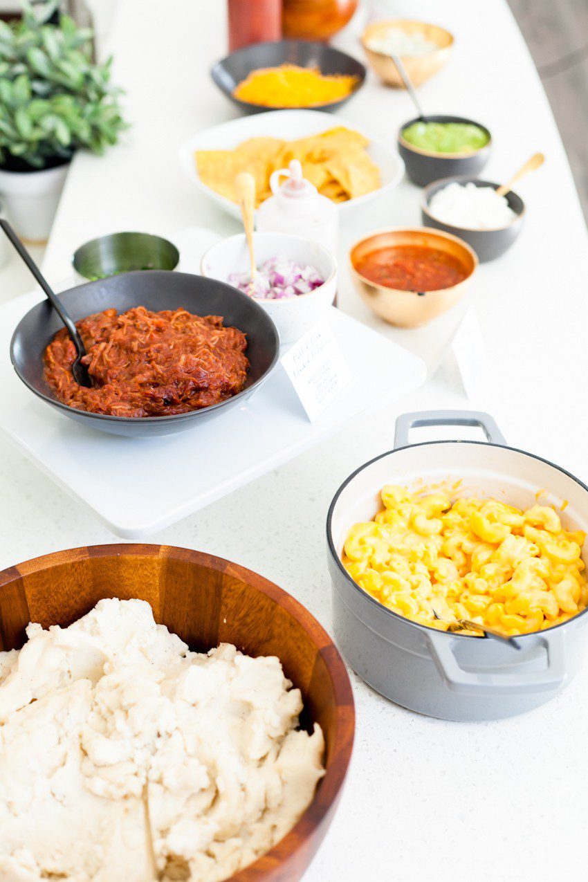 Between the last few lazy weekends of football we have left and the holiday season upon us, we've no shortage of entertaining at our doorstep. Welcome guests with open arms once you set up with a simple Mashed Potato and Mac and Cheese Bar that will rival any game on the big screen!