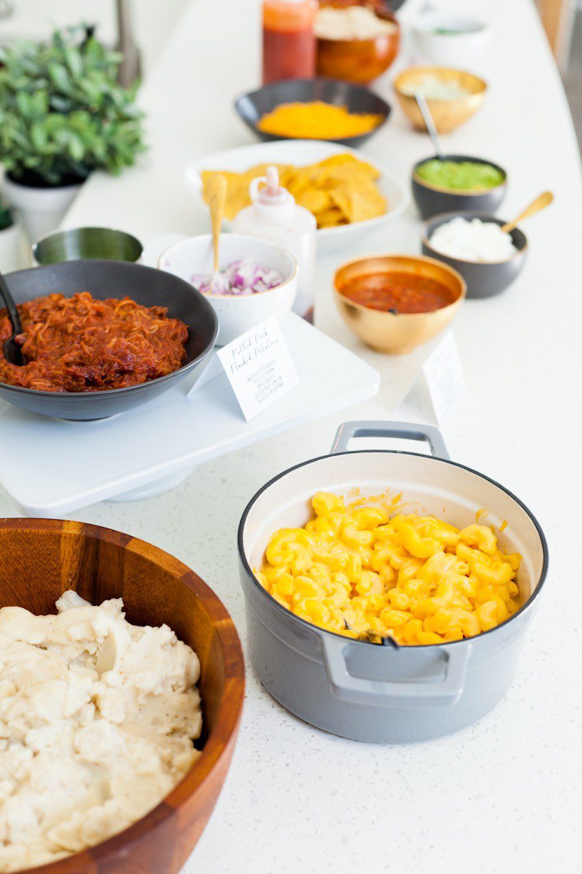 Between the last few lazy weekends of football we have left and the holiday season upon us, we've no shortage of entertaining at our doorstep. Welcome guests with open arms once you set up with a simple Mashed Potato and Mac and Cheese Bar that will rival any game on the big screen!