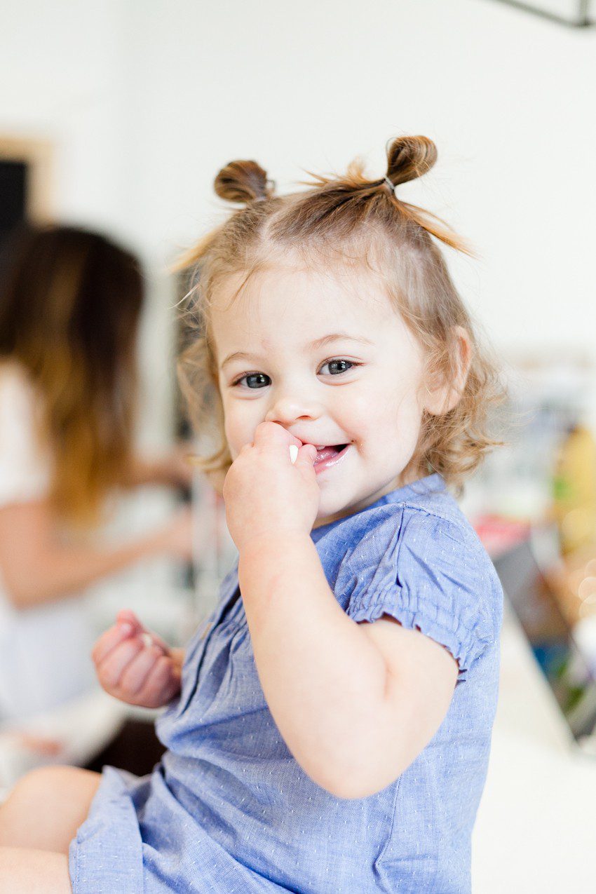 A simple and easy Valentine's Day chocolate dipped pretzels treat, that you can make with and for your kids (they look like they took more effort than they really do!), by Tabitha Blue of Fresh Mommy Blog - Valentines Day Lovely Chocolate Dipped Pretzels by popular Florida lifestyle blogger Fresh Mommy Blog