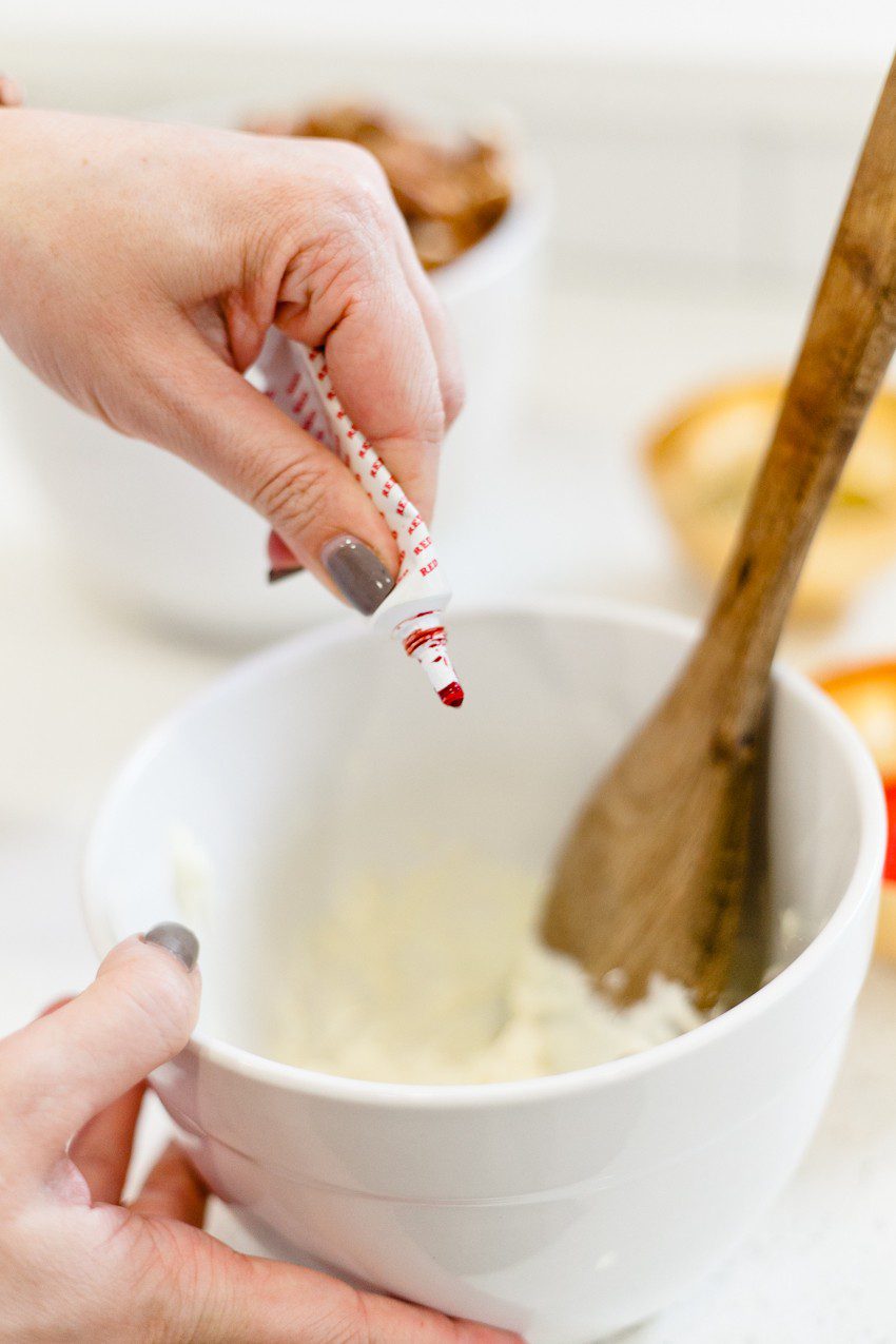 A simple and easy Valentine's Day chocolate dipped pretzels treat, that you can make with and for your kids (they look like they took more effort than they really do!), by Tabitha Blue of Fresh Mommy Blog - Valentines Day Lovely Chocolate Dipped Pretzels by popular Florida lifestyle blogger Fresh Mommy Blog