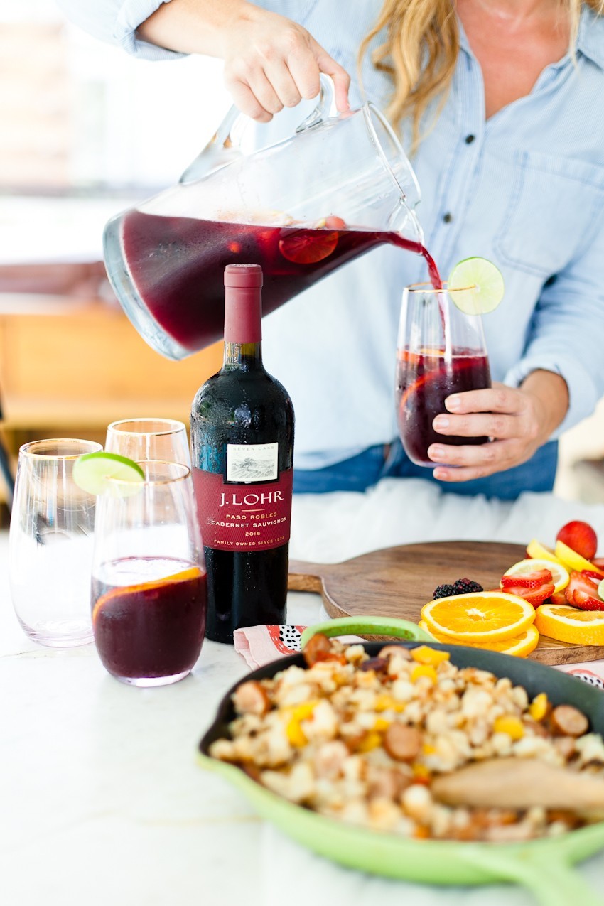 What better way to celebrate the season than with a blood orange berry summer sangria? It's our go-to summer drink and with one big hack to make sangria even easier, this recipe is perfect for your next gathering or summer get together!- Refreshing Blood Orange Berry Summer Sangria Recipe featured by popular Florida lifestyle blogger, Tabitha Blue of Fresh Mommy Blog