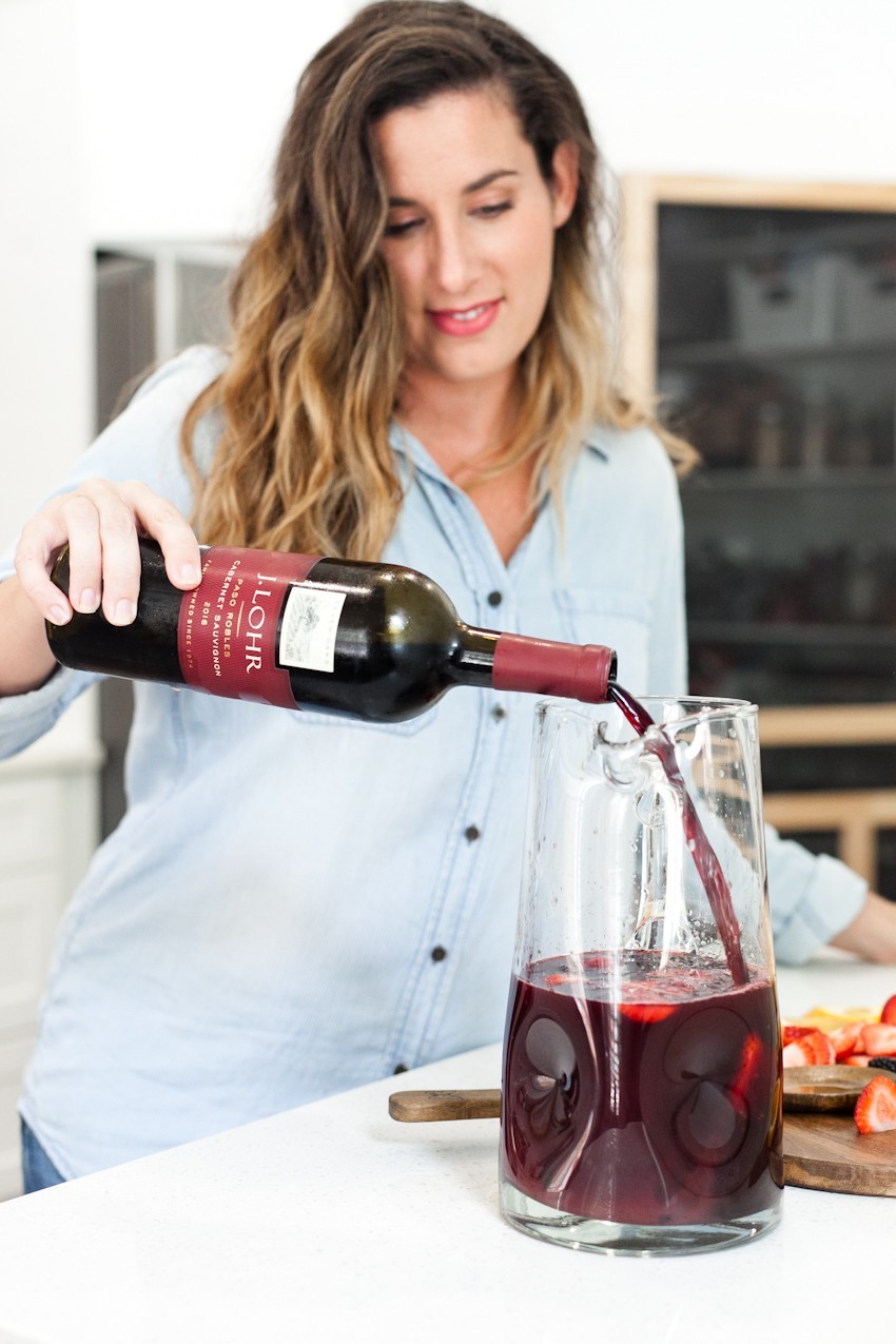 What better way to celebrate the season than with a blood orange berry summer sangria? It's our go-to summer drink and with one big hack to make sangria even easier, this recipe is perfect for your next gathering or summer get together! - Refreshing Blood Orange Berry Summer Sangria Recipe featured by popular Florida lifestyle blogger, Tabitha Blue of Fresh Mommy Blog