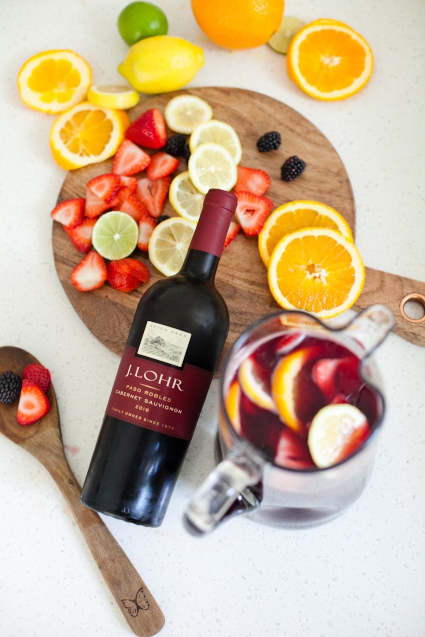 What better way to celebrate the season than with a blood orange berry summer sangria? It's our go-to summer drink and with one big hack to make sangria even easier, this recipe is perfect for your next gathering or summer get together! - Refreshing Blood Orange Berry Summer Sangria Recipe featured by popular Florida lifestyle blogger, Tabitha Blue of Fresh Mommy Blog