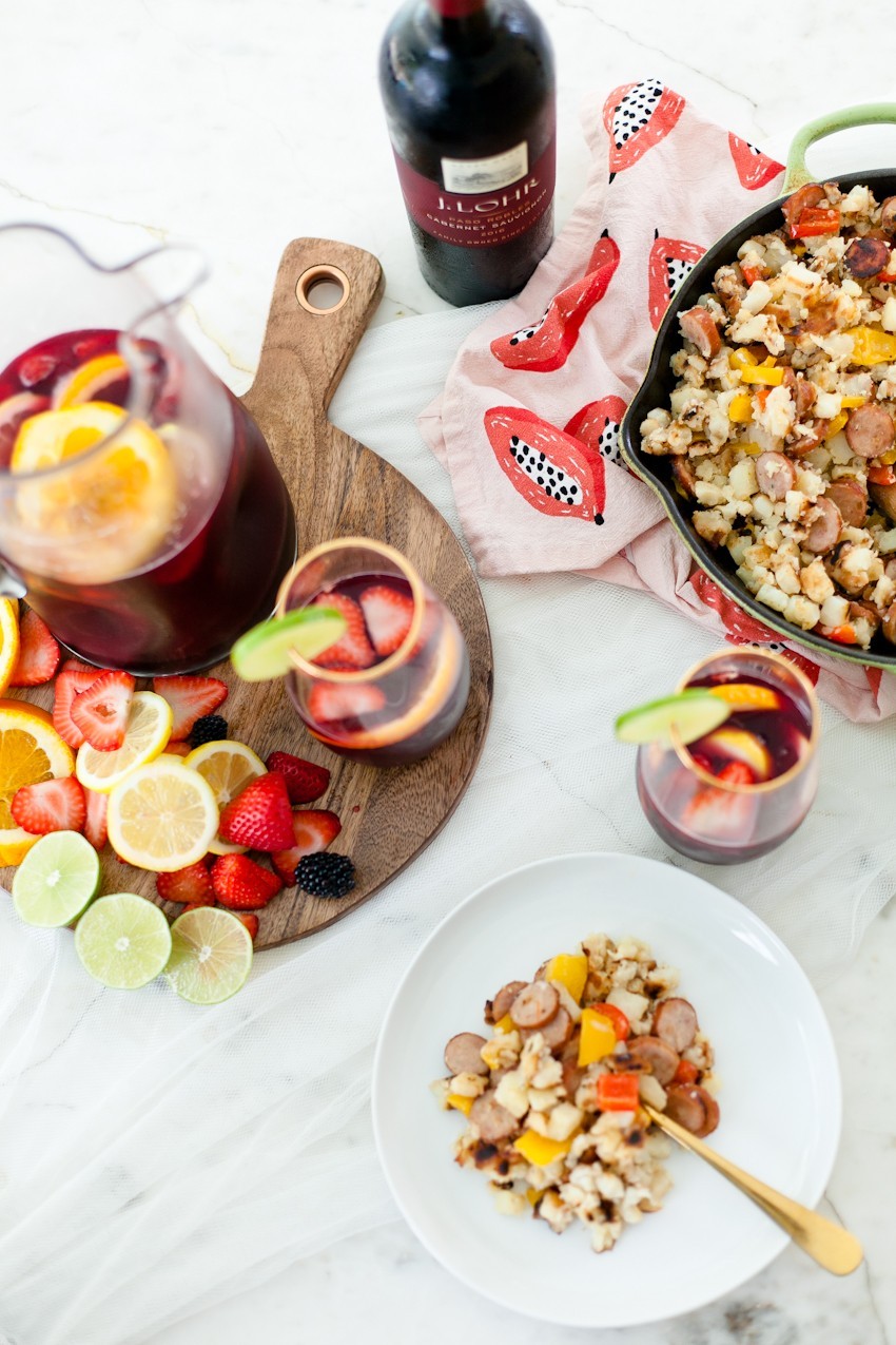 What better way to celebrate the season than with a blood orange berry summer sangria? It's our go-to summer drink and with one big hack to make sangria even easier, this recipe is perfect for your next gathering or summer get together! - Refreshing Blood Orange Berry Summer Sangria Recipe featured by popular Florida lifestyle blogger, Tabitha Blue of Fresh Mommy Blog