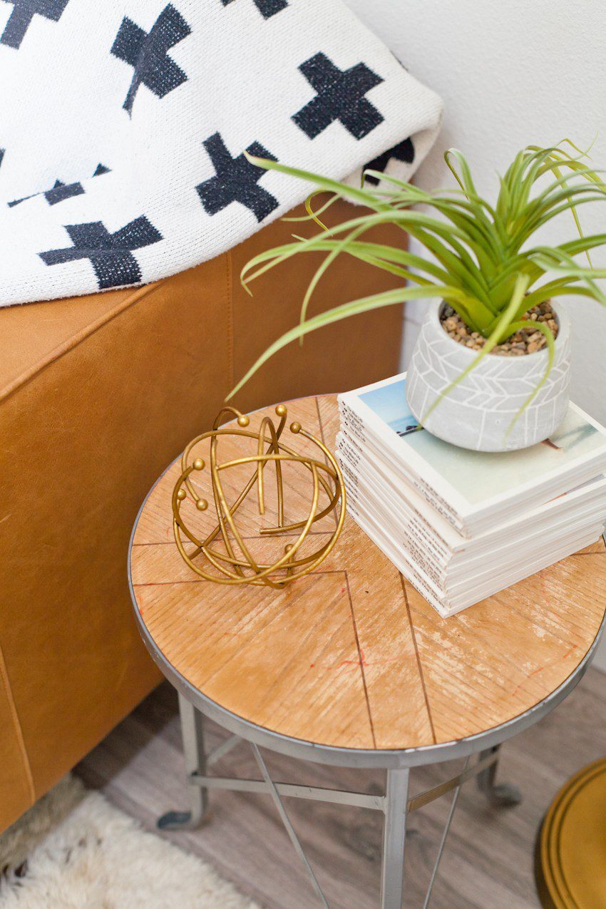 Seeing past dated paint colors, a wall of mirrors, popcorn ceiling and mismatched flooring, this ultimate living room has been completely transformed to a cozy and comfortable open family living space with bold statement pieces like our Article sofa, neutral colors and touches of sleek mid century and Scandinavian inspired design. The ultimate living room makeover before and after for a busy family from popular Florida lifestyle blogger Tabitha Blue of Fresh Mommy Blog. | Article sofa featured in the latest living room makeover by top Florida lifestyle blog, Fresh Mommy Blog