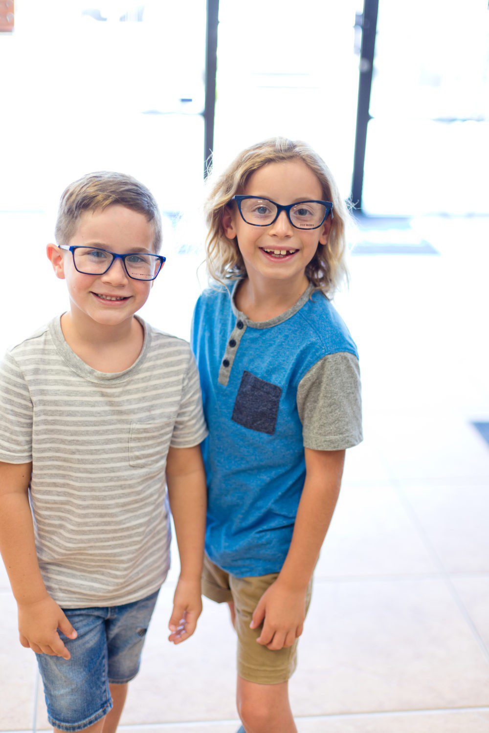 Back to School Eye Exam: How to Prepare your Child for a Successful Academic Year | Back to School Eye Exam: How to Prepare your Child for a Successful Academic Year by popular Florida lifestyle blog, Fresh Mommy Blog: image of two young boys wearing glasses.