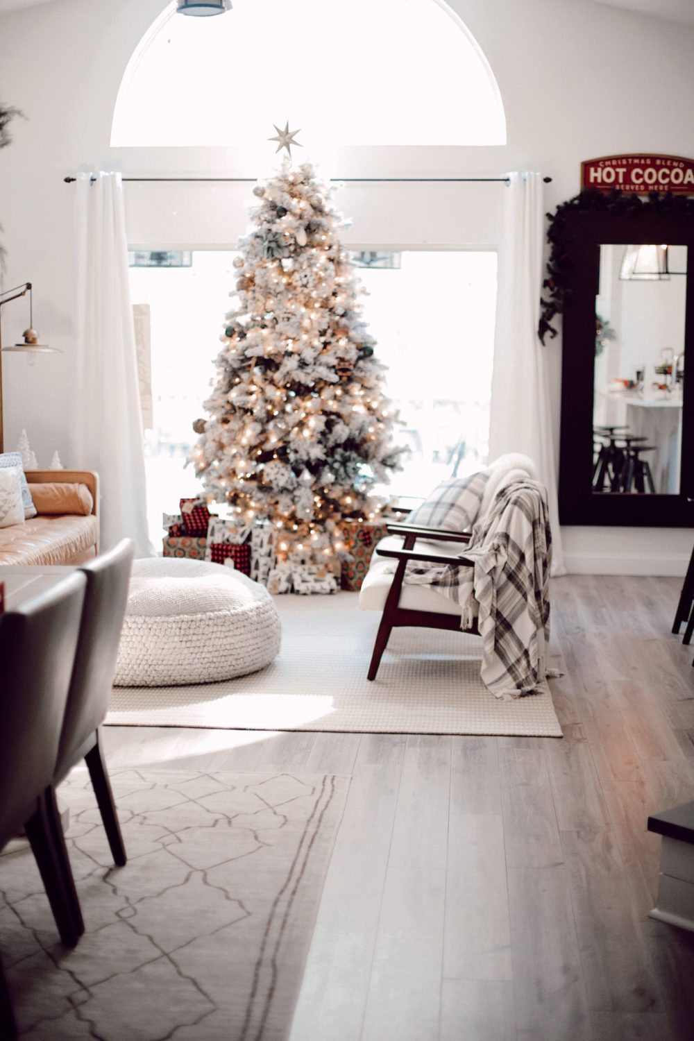 7 Geniously Efficient Mom Hacks for Home Design | 7 Genius Efficient Home Design Hacks for Moms by popular Florida life and style blog, Fresh Mommy Blog: image of a living room decorated with rugs and furniture from CORT Furniture Outlet.